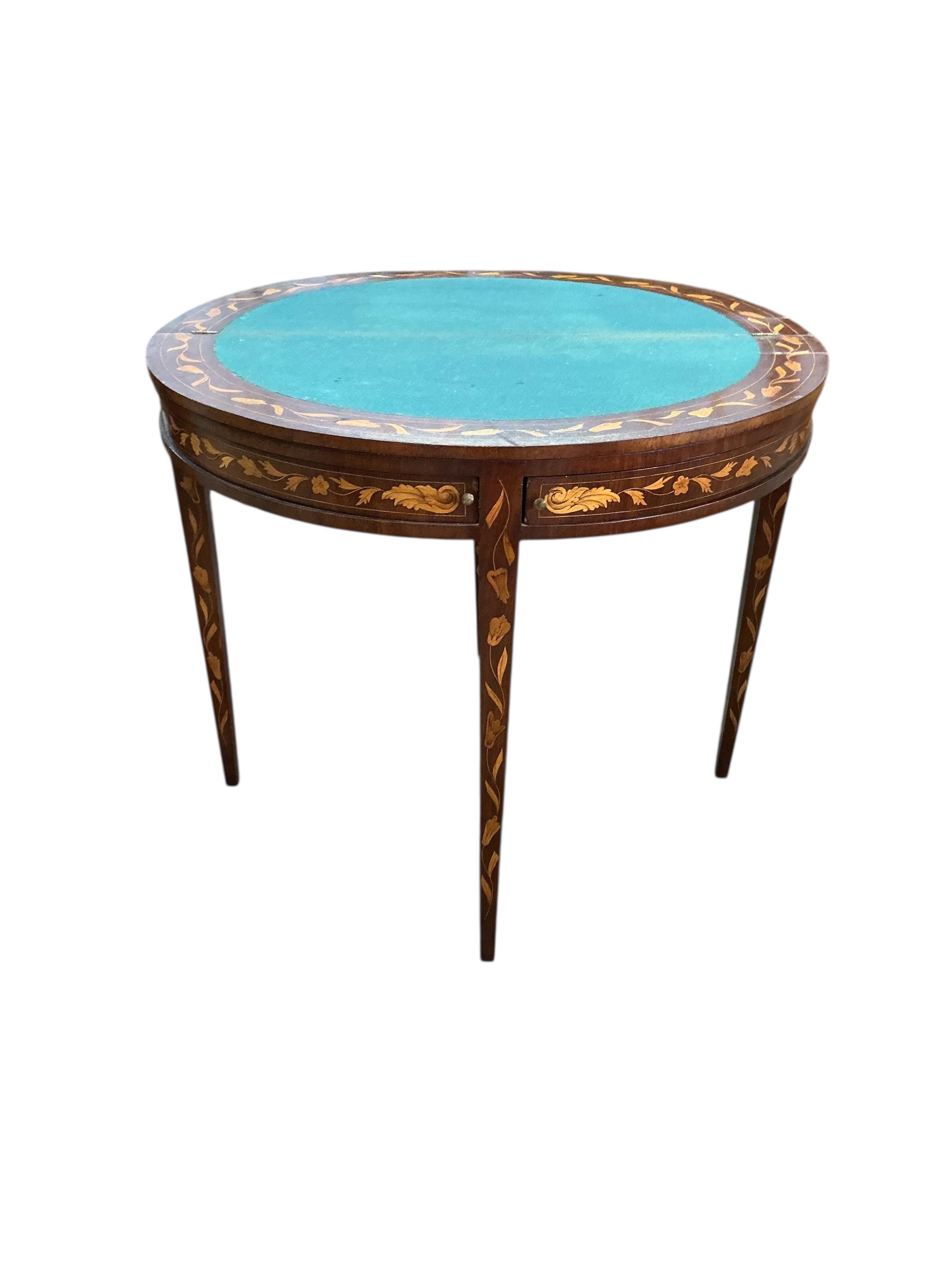 An early 19th century Dutch walnut floral marquetry folding card table, width 88cm, depth 44cm, height 76cm